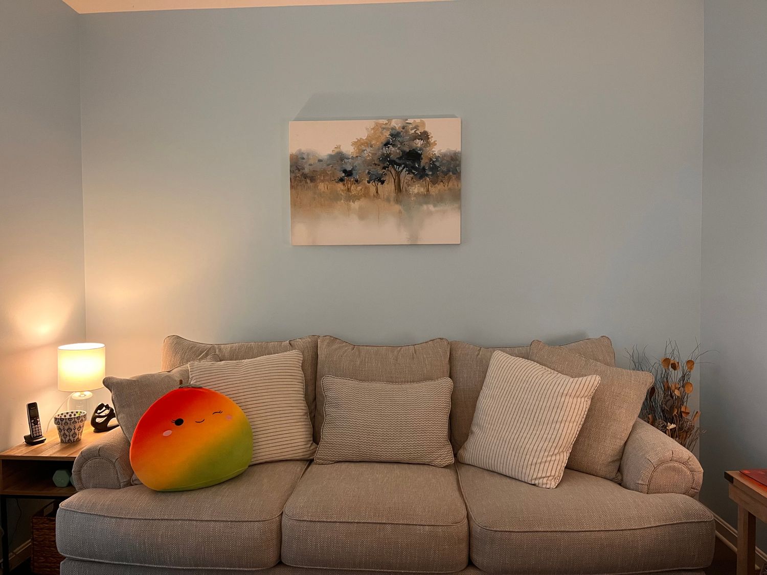 Inside Casey Foster's therapy office: a couch and calm, comfortable seating
